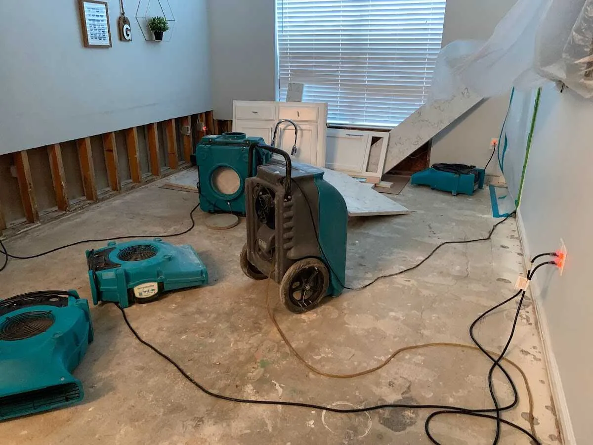 Dehumidifier in flood-cut room for Water Damage Restoration in Northampton
